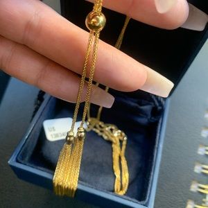 14 karat gold necklace never worn adjustable